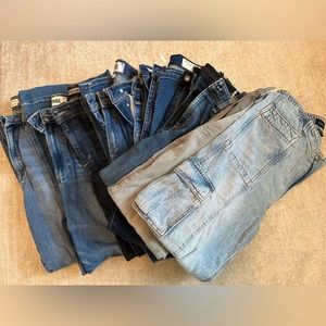 Lot of jeans for sale. Ten pair of jeans to be exact.